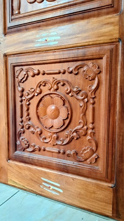 Close-up of central carved floral medallion rosette