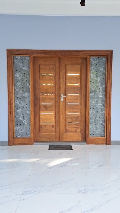 Full front elevation of double timber entrance door with floral frosted sidelights and horizontal inlays