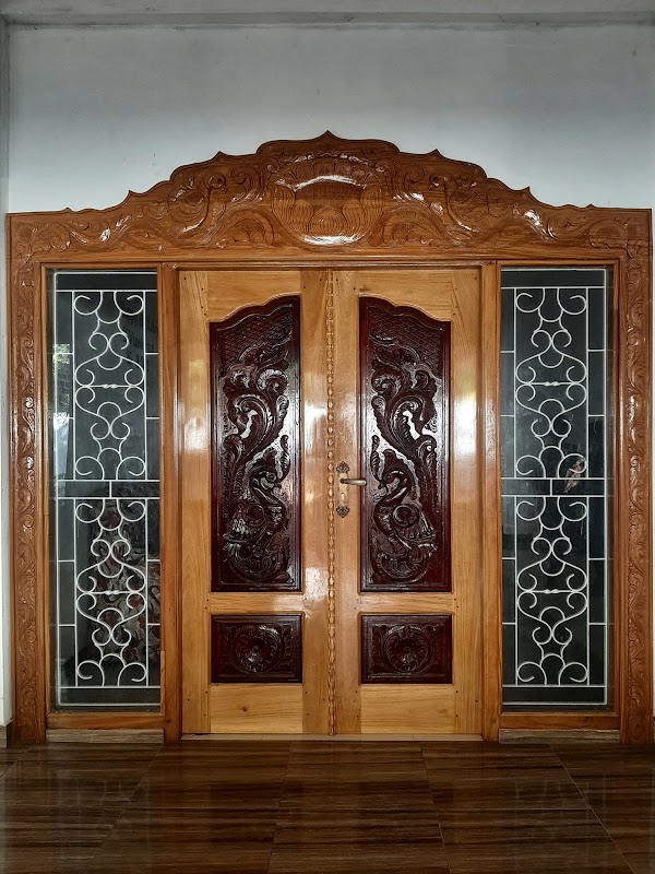 Veranda installation elevation showing paired peacock carved entrance