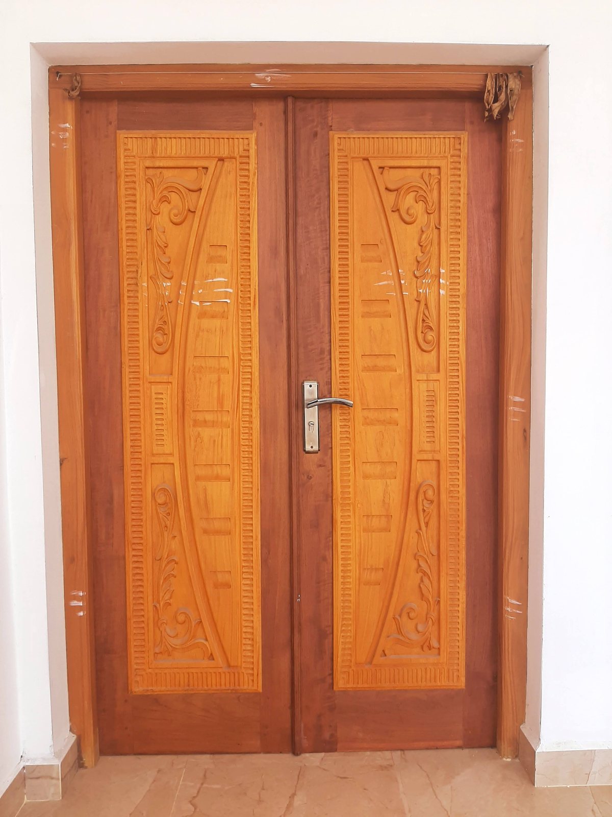 Classical Sri Lankan Hardwood Door - Authentic Sri Lankan hardwood entrance door showcasing master carver craftsmanship.