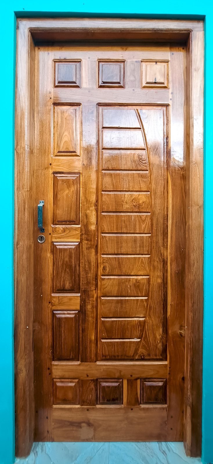 Angled view of hardwood door showing depth and profile