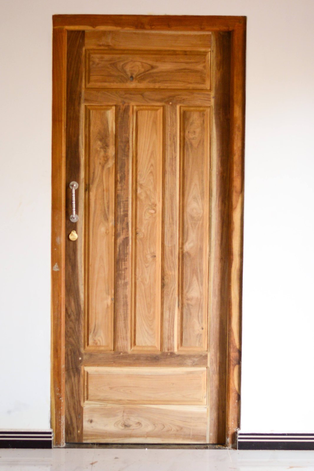 Grand residence double entrance door pair crafted from heavy timber