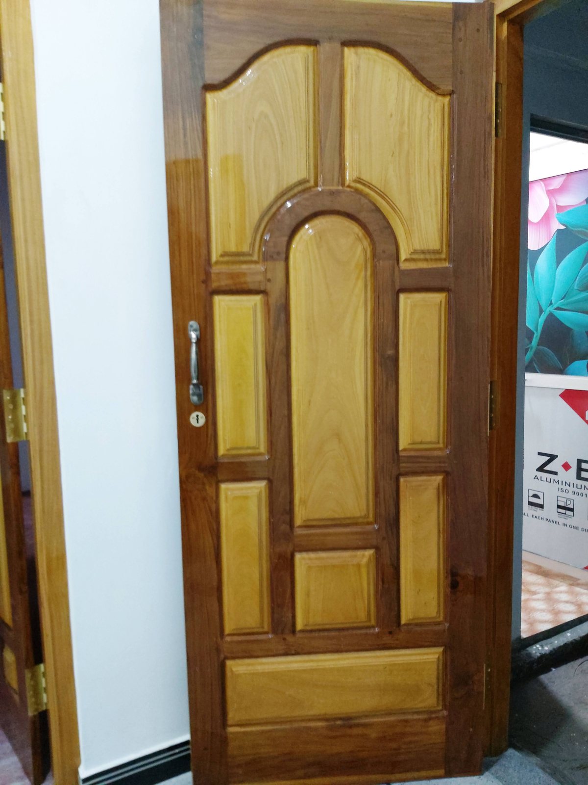 Solid Hardwood Main Entrance Door - Substantial solid wood main door built for enduring durability, privacy, and security.