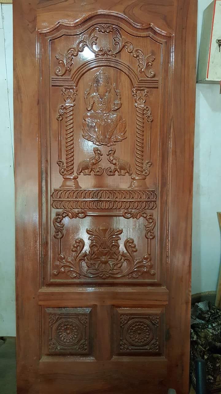 Heritage Carved Timber Entrance - Heritage style entrance door featuring traditional Tamil and Sri Lankan wood carving accents.