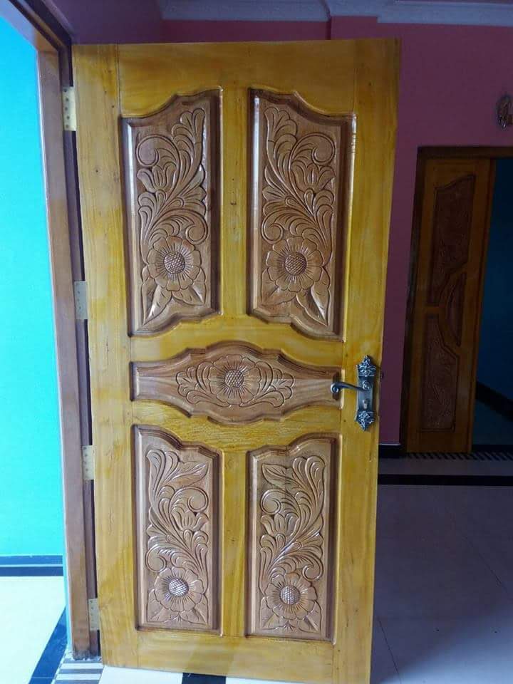 Detail view of traditional relief carving and polished surface