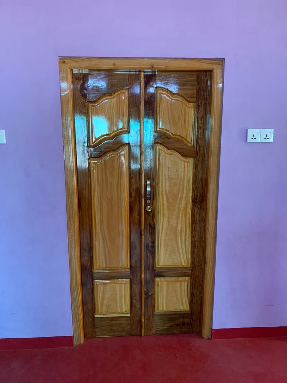 Angled view showing timber panel depth and side jambs