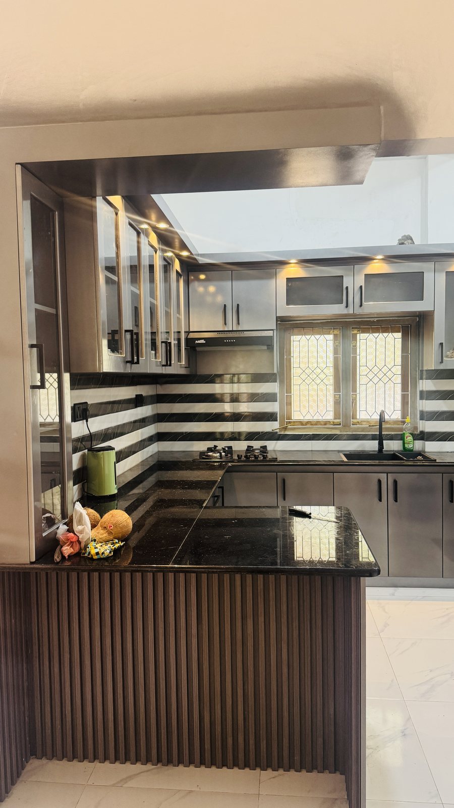 Modular kitchen cupboard installation with upper and lower storage