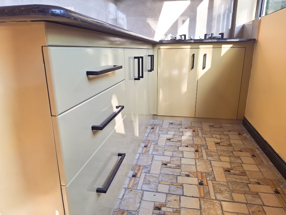 Close-up of matte olive modular drawers with sleek edge pulls