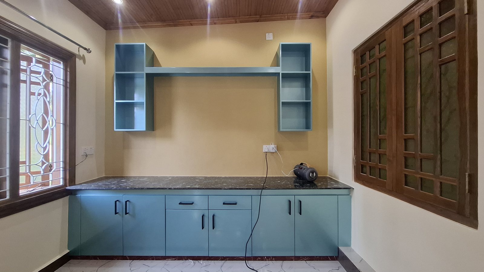 Contemporary timber TV wall unit with media storage and display shelving