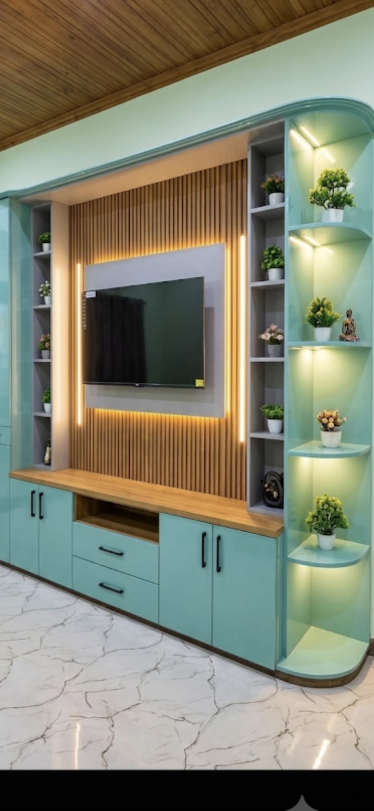 Angled view showing the curved display end and lower storage cabinets
