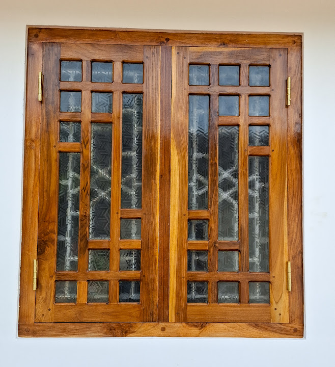 Two-section timber window with rectangular glazing grid