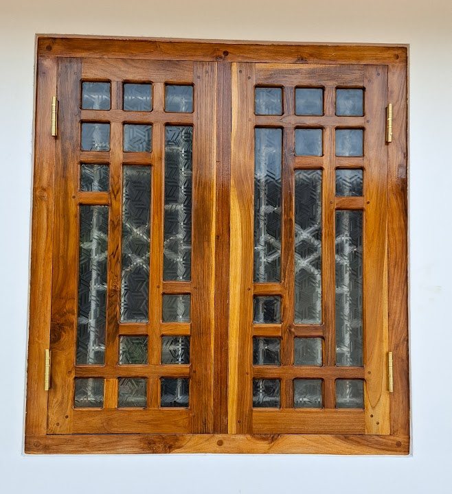Timber casement window with geometric wood pattern and glass panes